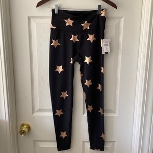 Back and rose gold workout or compression pants